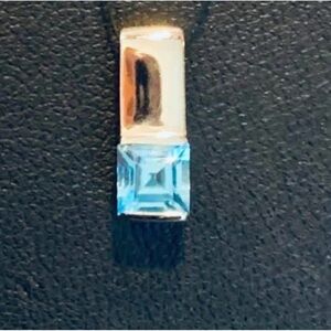 Elegant White Gold and BlueTopaz Pendant